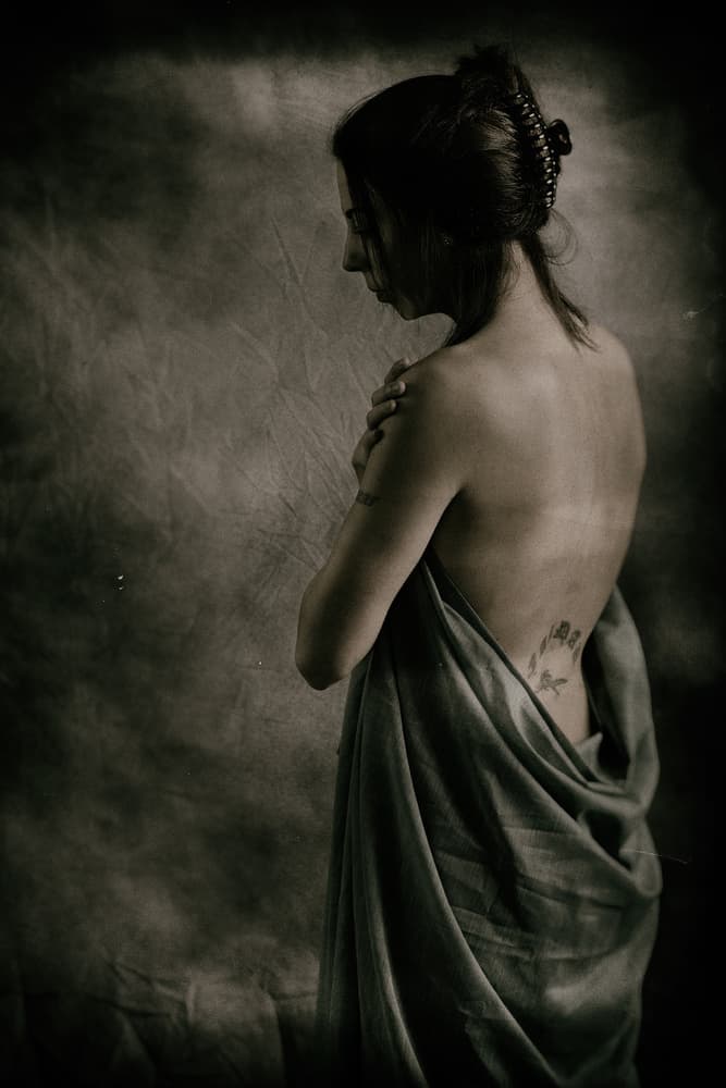 Pensive Woman's Back by Jacob Tuinenga — canvas wall art