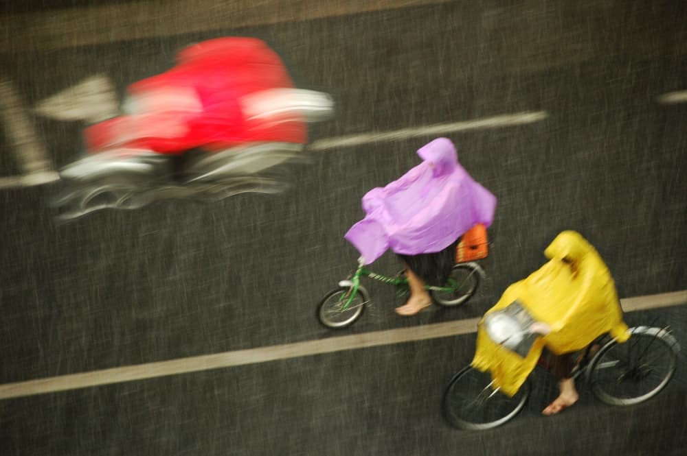 Rainy Day Cyclists by Jacek Stefan — canvas wall art