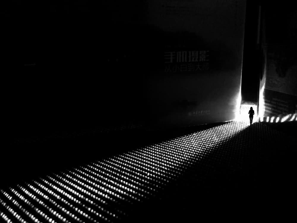 Lone Figure Light Path by Lammakmak — canvas wall art