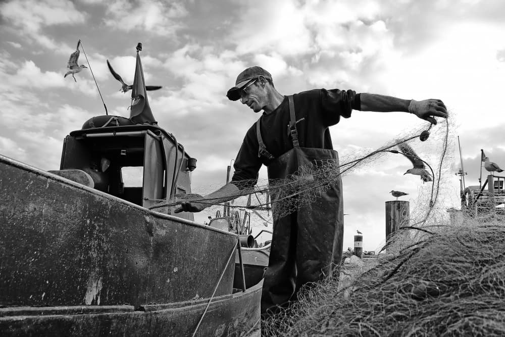 Fisherman and His Net by Josefina Melo — canvas wall art