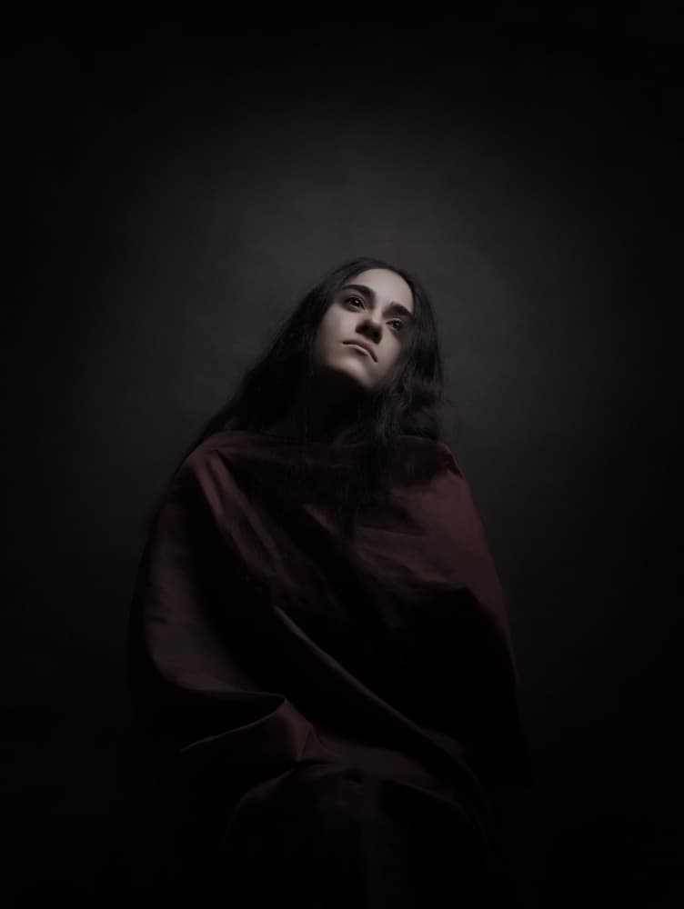 Pensive Woman Looking Up by Moein Hasheminasab — canvas wall art