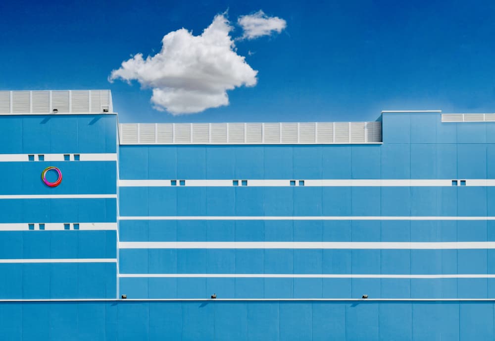 Bright Blue Building Sky by Arnon Orbach — canvas wall art