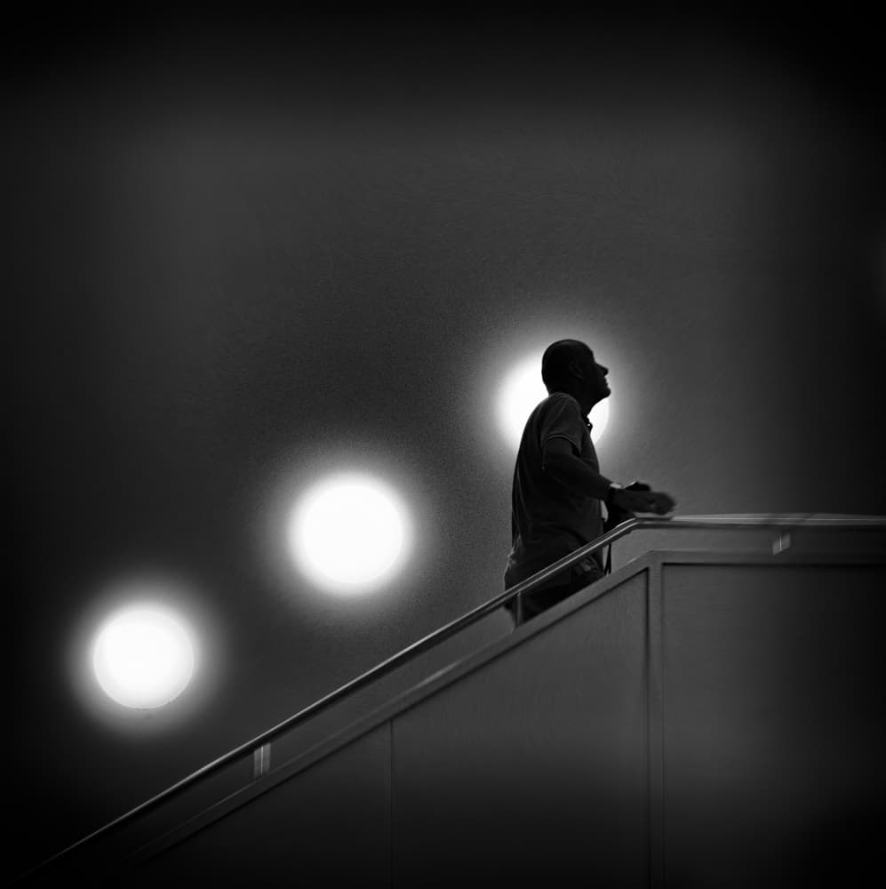 Man Ascending Lights by Rolf Lampert — canvas wall art