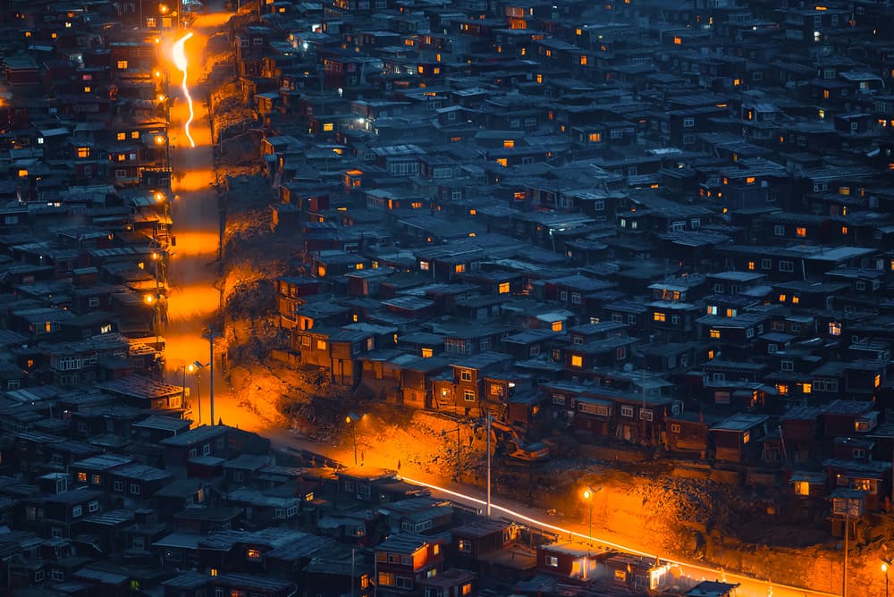 Illuminated Hillside City by TIANQI — canvas wall art