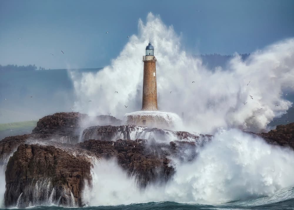 Waves Crashing Lighthouse by Sergio Saavedra Ruiz — canvas wall art