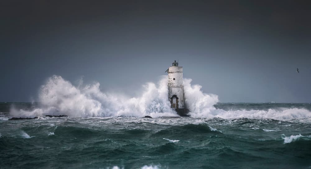 Lighthouse in Stormy Ocean by Daniele Atzori — canvas wall art
