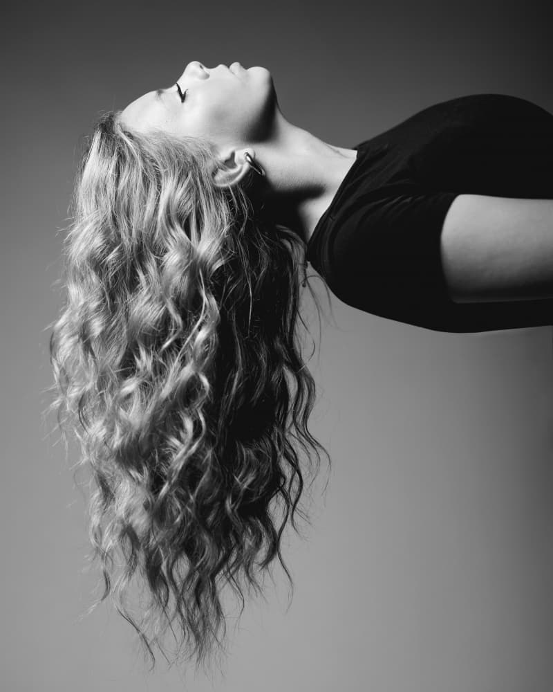Flowing Curly Hair Portrait by Tyler McAuley — canvas wall art