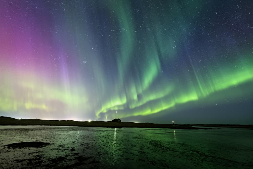 Vibrant Northern Lights Night by Bragi Kort — canvas wall art