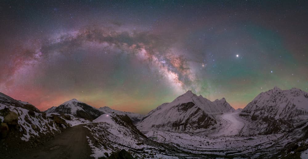 Aurora Over Snowy Peaks by Vikas Chander — canvas wall art