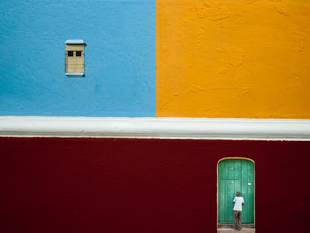 Man Against Colorful Walls by Svetlin Yosifov — canvas wall art