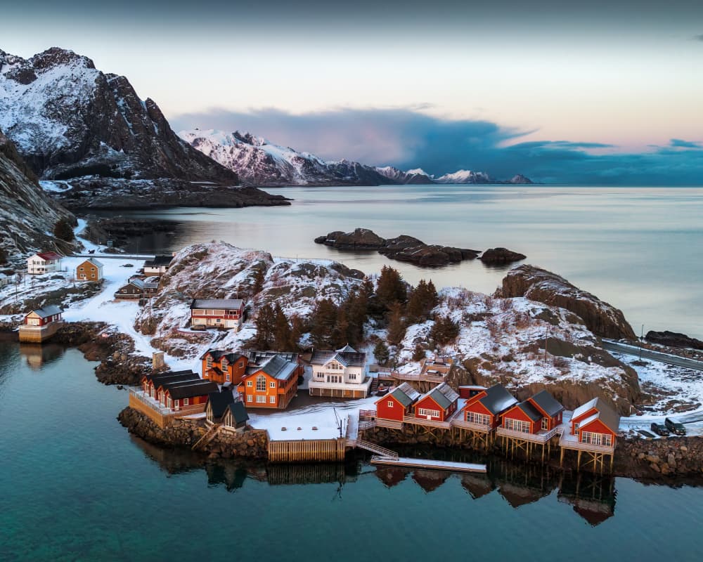 Snowy Norwegian Fjord Village by Marc van Oostrum — canvas wall art