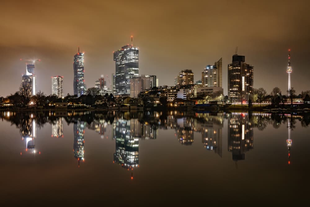 Illuminated City Reflections by Erik Proper — canvas wall art