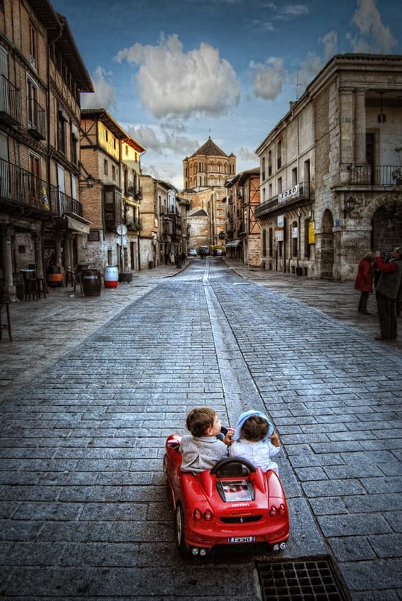 Kids Red Car Adventure by Jose C. Lobato — canvas wall art