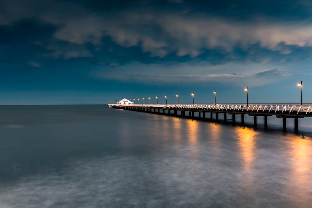 Illuminated Ocean Pier by Christopher Perez Liedl — canvas wall art
