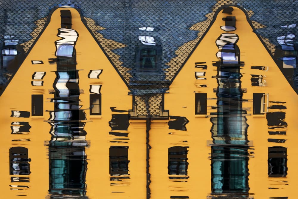 Wavy Yellow Building Reflection by Hans-Wolfgang Hawerkamp — canvas wall art