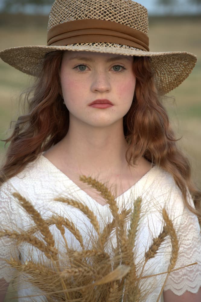 Thoughtful Girl Wheat Field by Iris Resch — canvas wall art