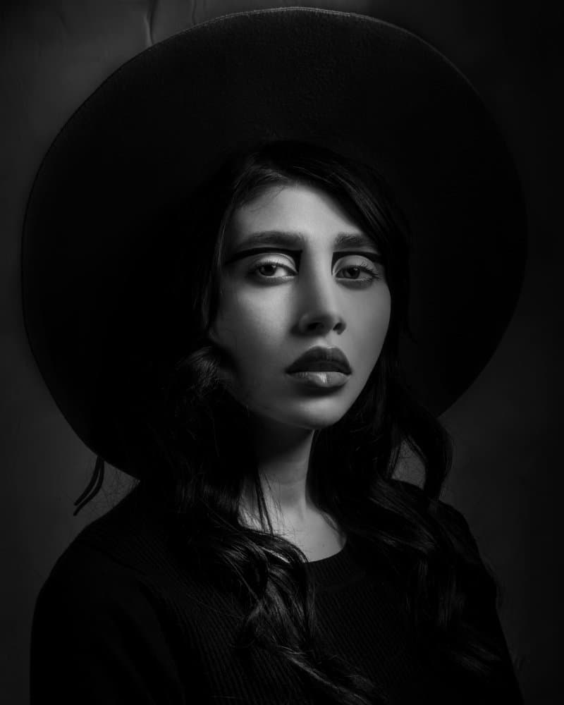 Dramatic Hat Portrait by Khaksar — canvas wall art