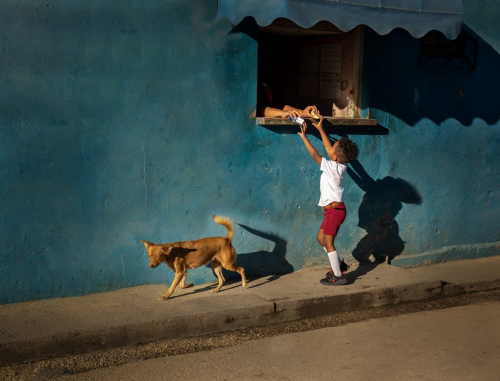 Child Reaching Blue Wall by Yuan Su — canvas wall art