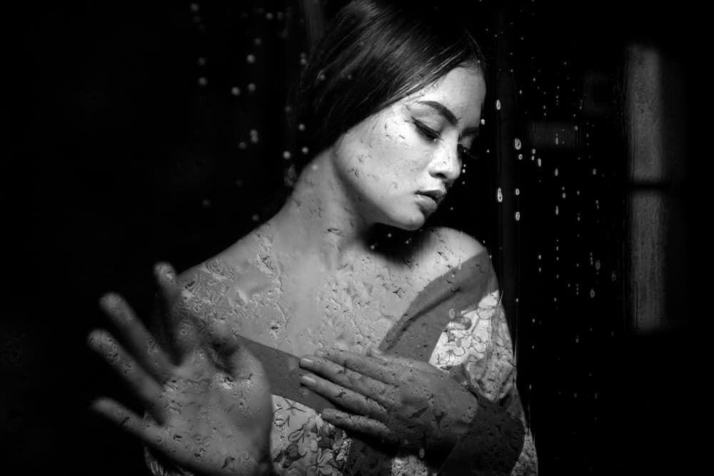Pensive Woman Raindrops by Arief Siswandhono — canvas wall art