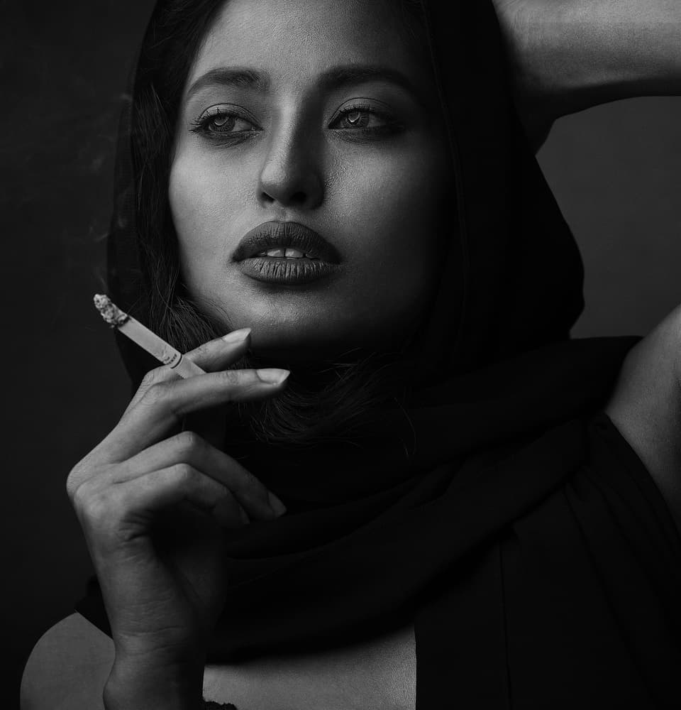Dramatic Woman Smoking by James Mahfuz — canvas wall art