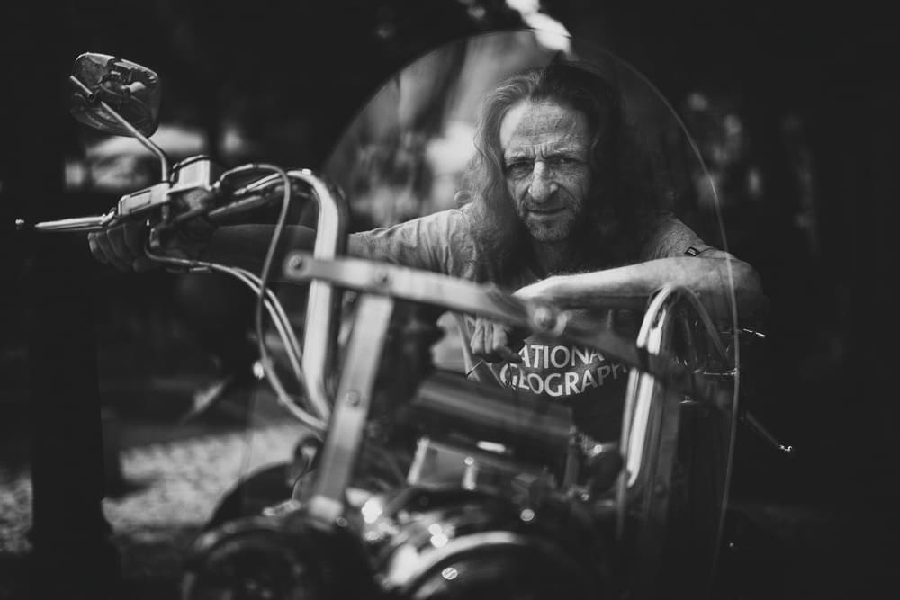 Intense Biker Portrait by Yuri Shepelev — canvas wall art