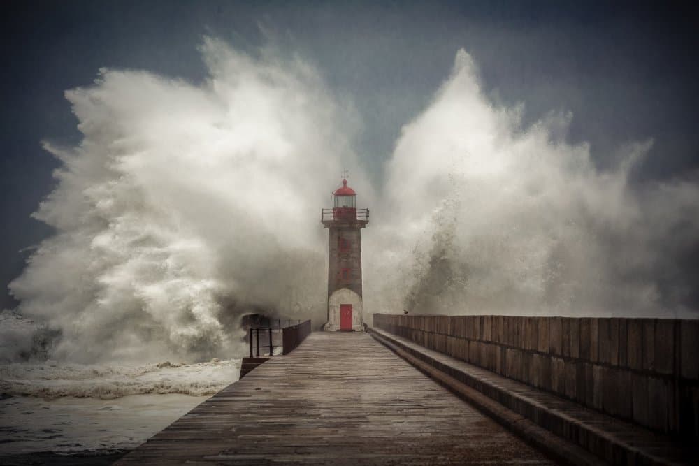 Lighthouse Amidst Storm Waves by Marco Faria — canvas wall art
