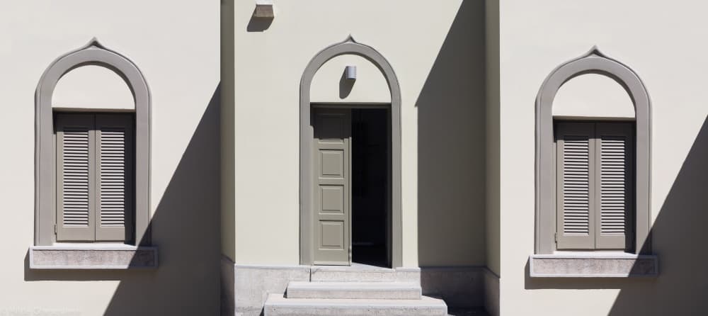 Arched Facade Shadows by Hilde Ghesquiere — canvas wall art
