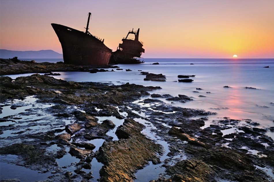 Abandoned Ship Sunset by Maria Kaimaki — canvas wall art