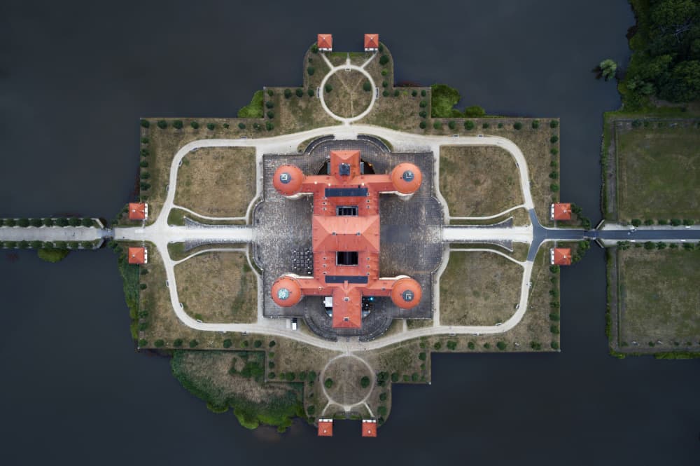 Symmetrical Water Castle by Łukasz Małkiewicz — canvas wall art
