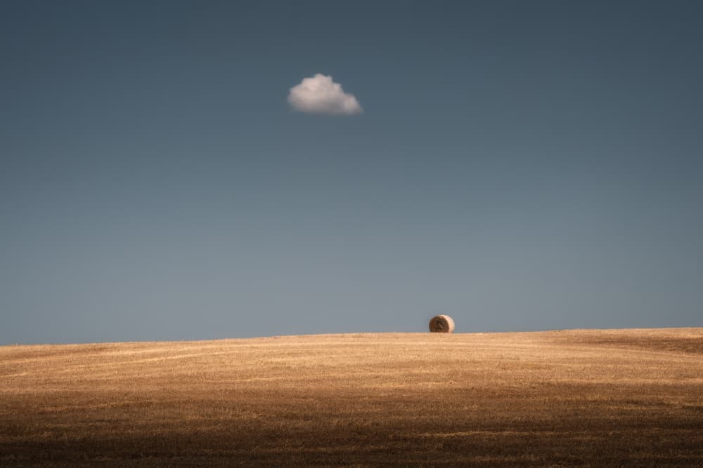 Minimalist Hay Bale Landscape by Thomas de Franzoni — canvas wall art