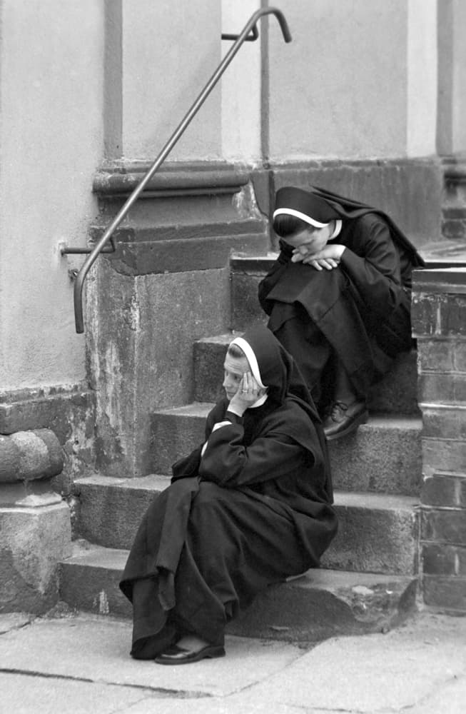Contemplative Nuns on Steps by Jacek Stefan — canvas wall art