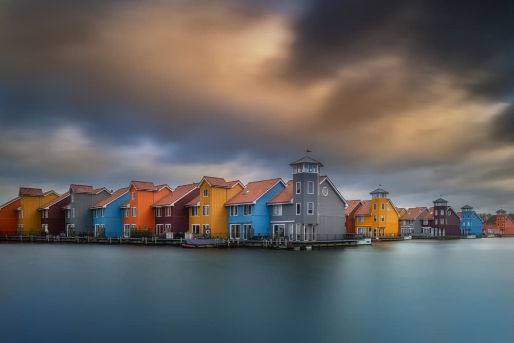 Vibrant Waterfront Homes by Adam Pachula — canvas wall art