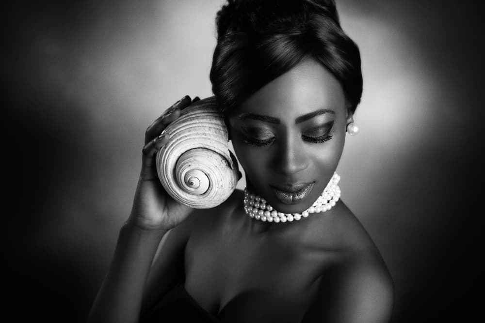 Elegant Woman Listening by Peppe Tambè — canvas wall art
