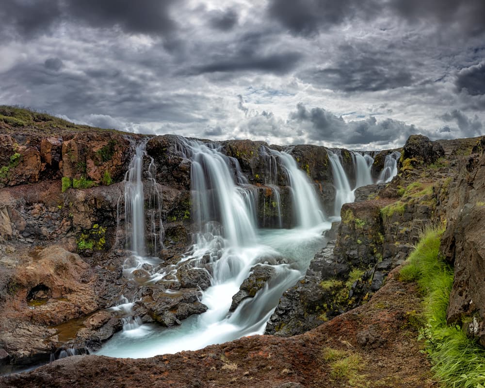 Dramatic Waterfall Landscape by Bragi Kort — canvas wall art