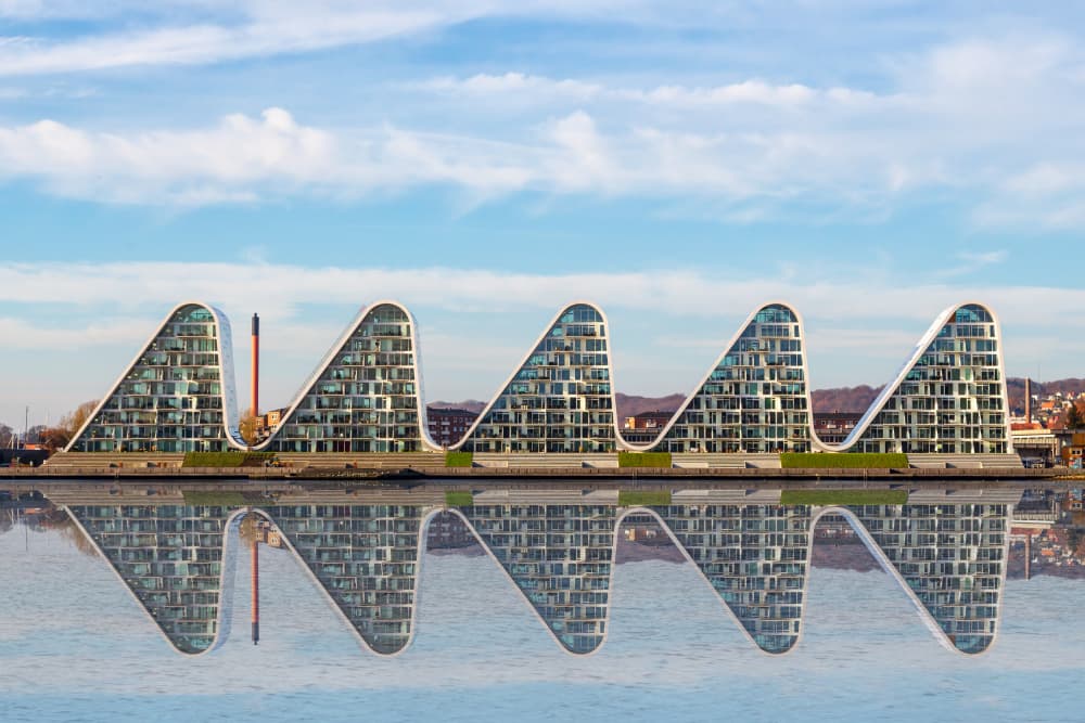 Wavy Waterfront Buildings by Leif Løndal — canvas wall art