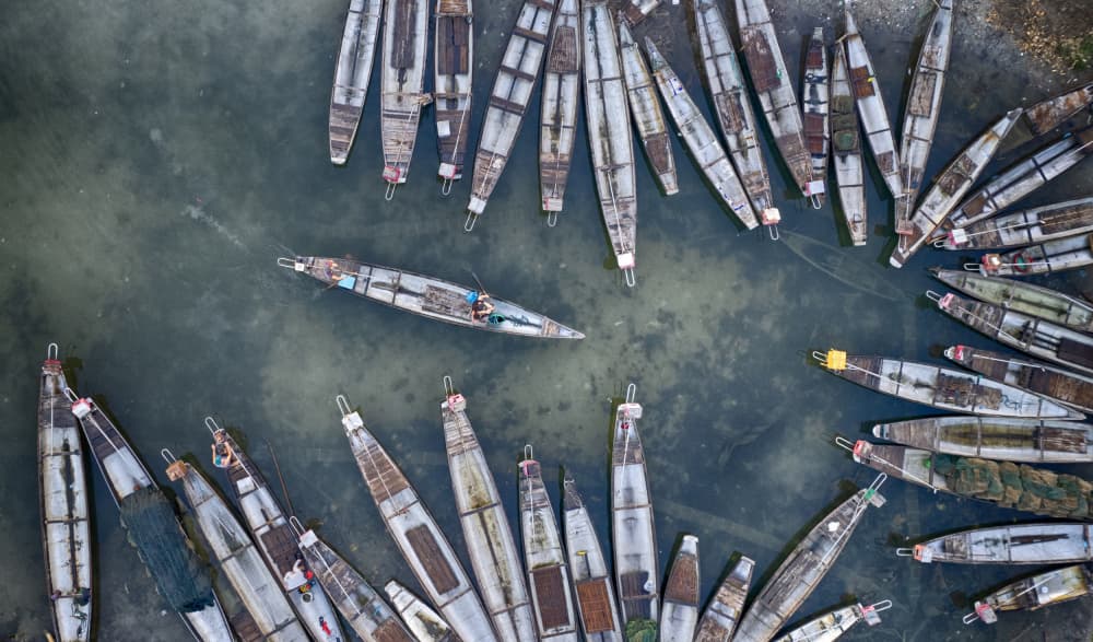 Boats on Calm Water by Angela Muliani Hartojo — canvas wall art