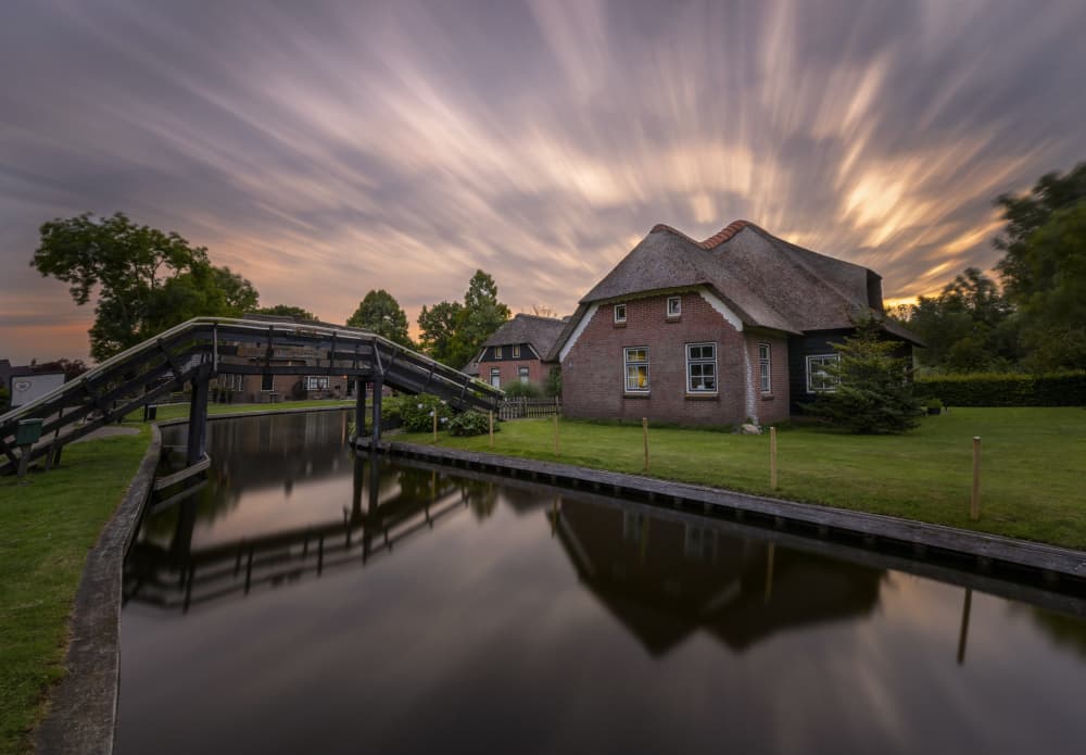 Serene Canal Sunset by Larry Deng APA — canvas wall art