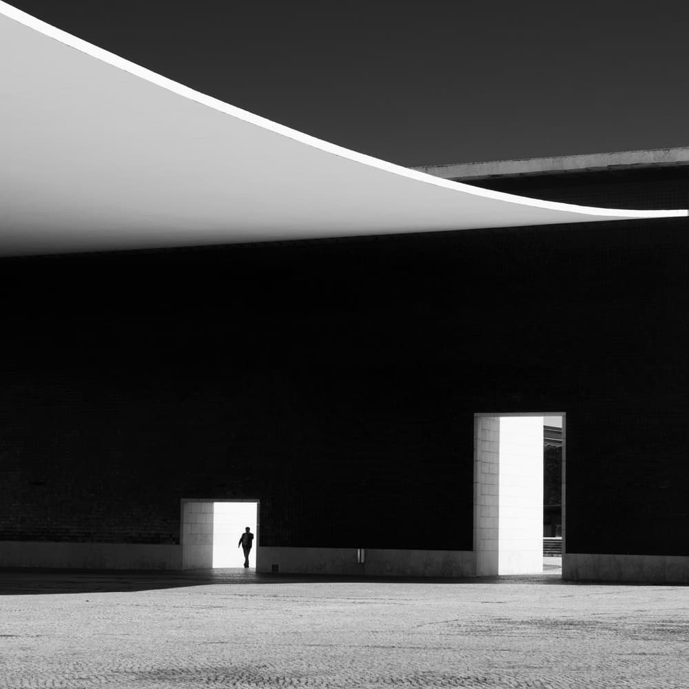 Minimalist Architecture Lone Figure by Luc Vangindertael (laGrange) — canvas wall art