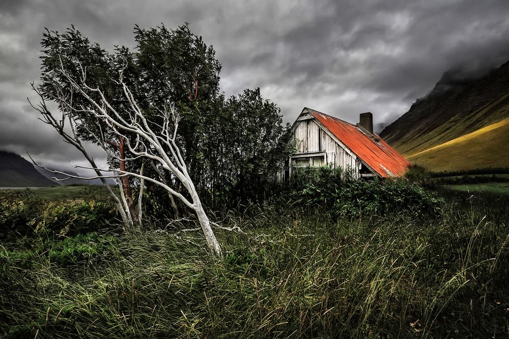 Stormy Mountain Cabin by Bragi Ingibergsson - BRIN — canvas wall art