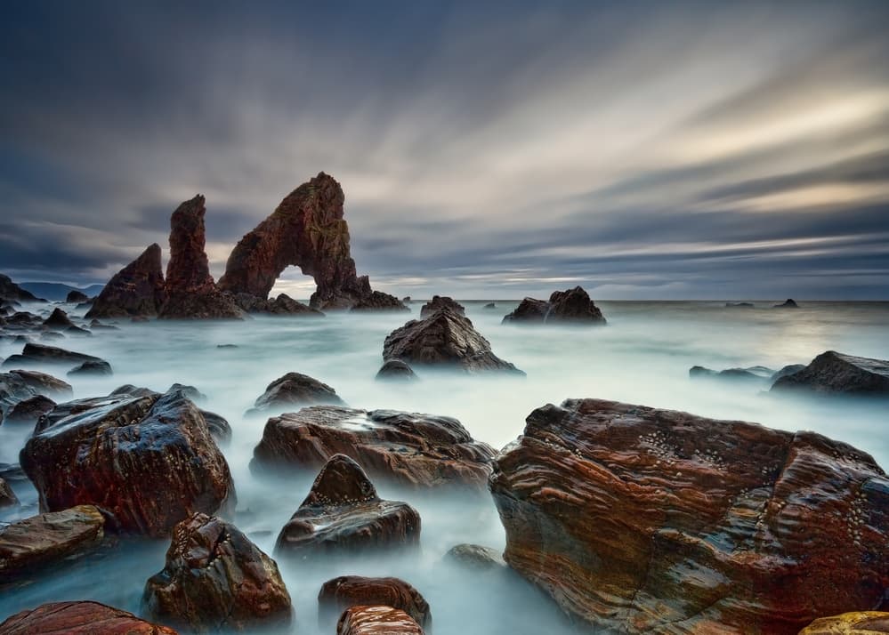 Misty Coastal Arch by Derek Smyth — canvas wall art