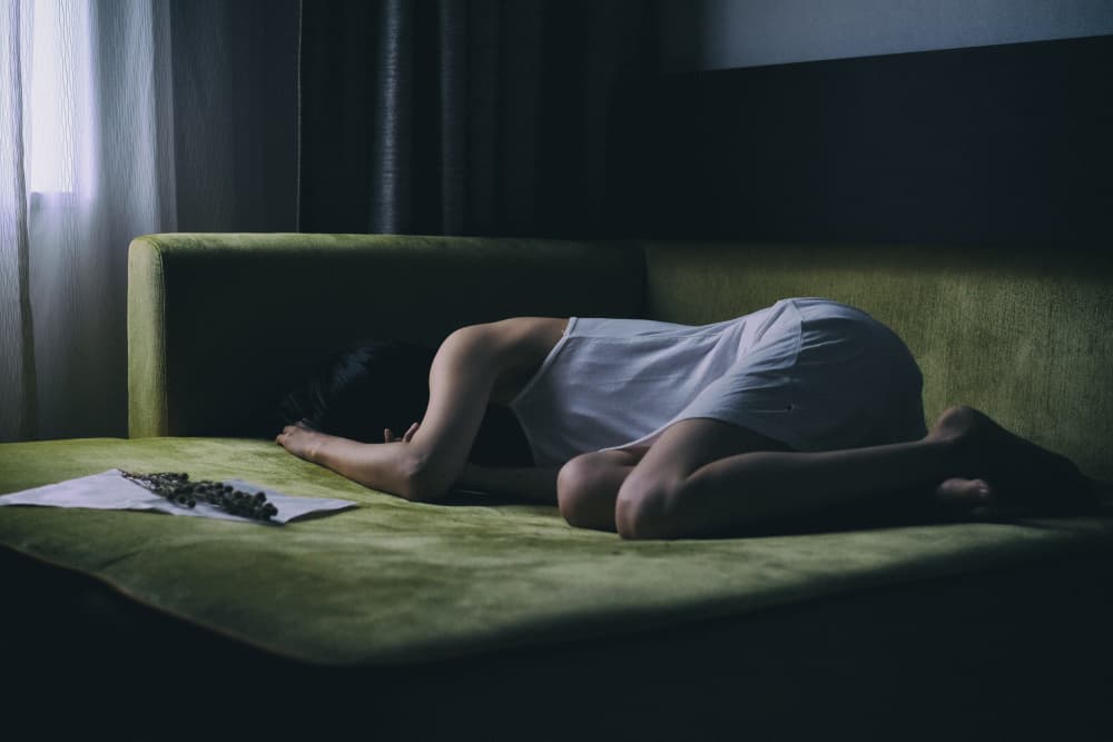 Lonely Woman on Couch by Takaaki Ishikura — canvas wall art