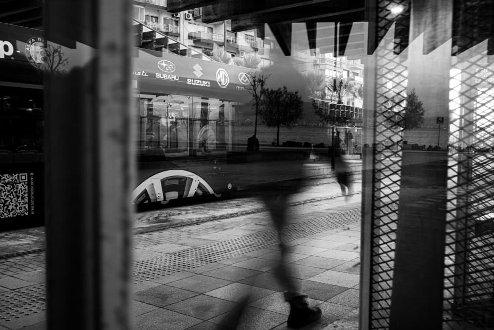 City Window Reflection by Ali Ayer — canvas wall art