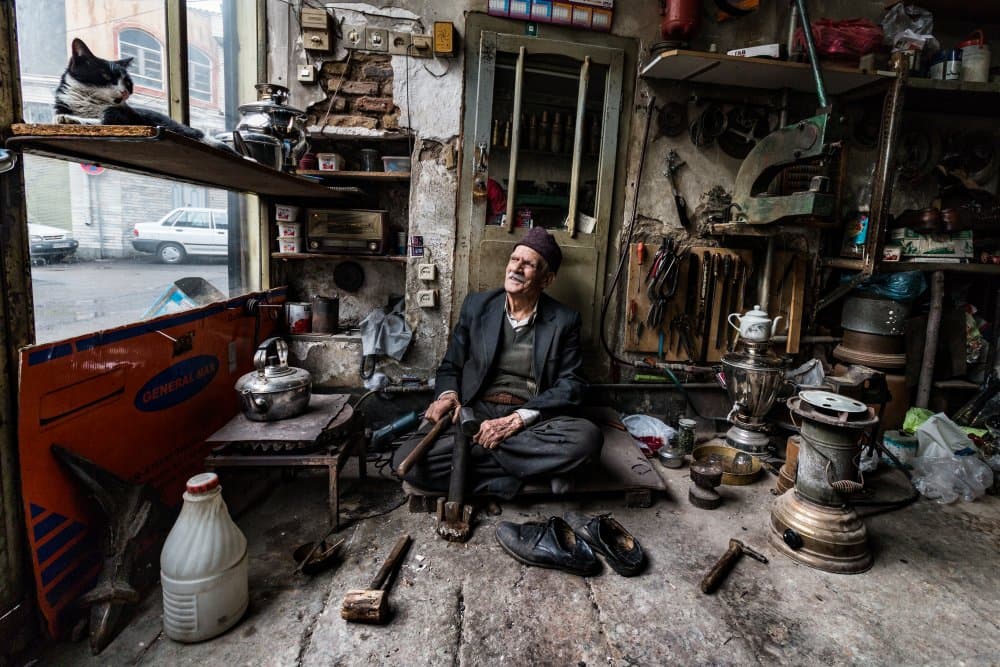 Old Man's Cozy Shop by AMIR ALI NAVADEH SHAHLA — canvas wall art