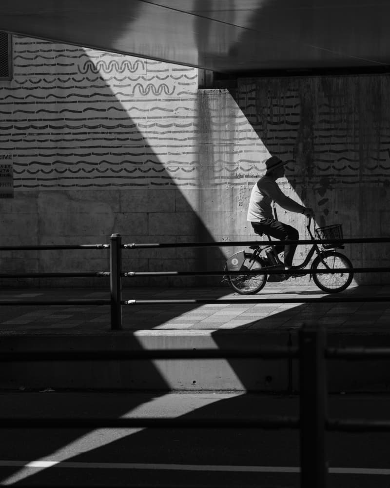 Cycling Through Light and Shadow by ficklog — canvas wall art
