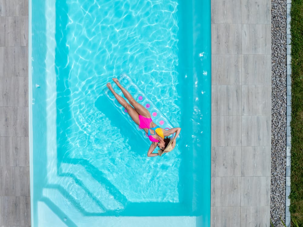 Woman Pool Relaxing by Azim Khan Ronnie — canvas wall art