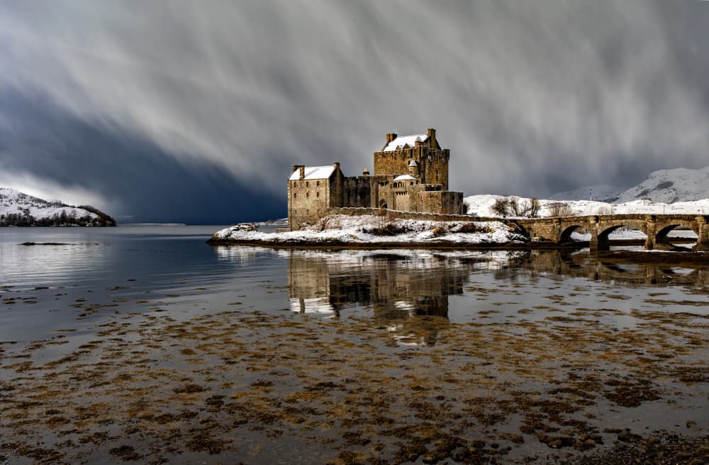 Snowy Scottish Castle Reflection by Daniel Springgay — canvas wall art