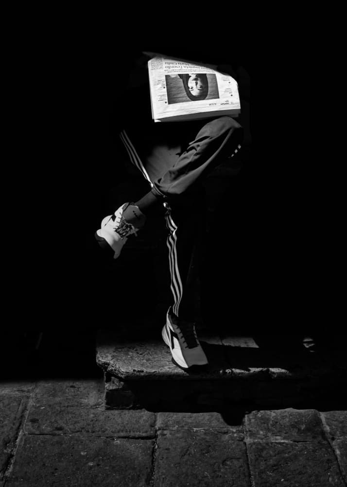 Mysterious Newspaper Reader by Luca Domenichi — canvas wall art