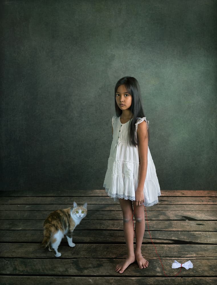 Quiet Girl with Cat by Svetlana Melik-Nubarova — canvas wall art