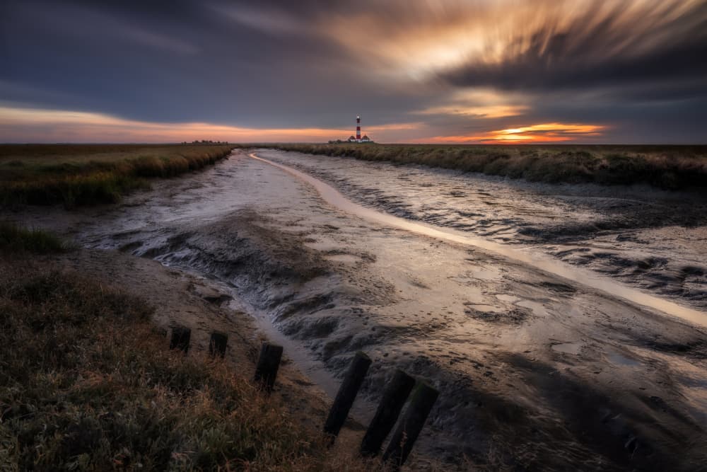 Lighthouse Mudflats Sunset by fotomarion — canvas wall art