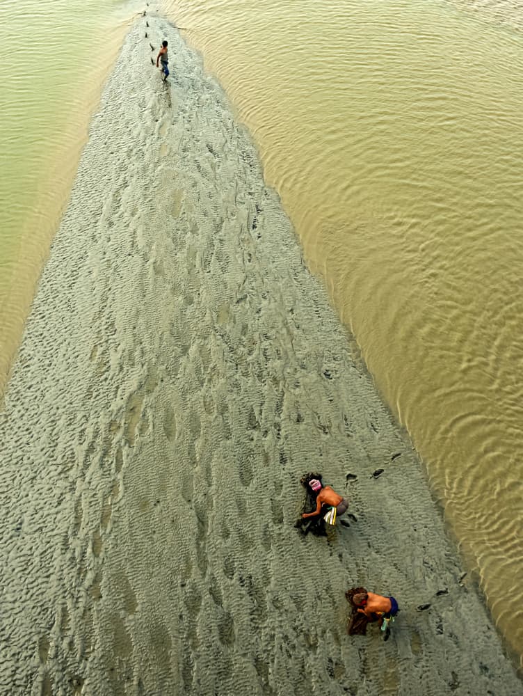 Children on River Sand by Ajit Kumar Majhi — canvas wall art